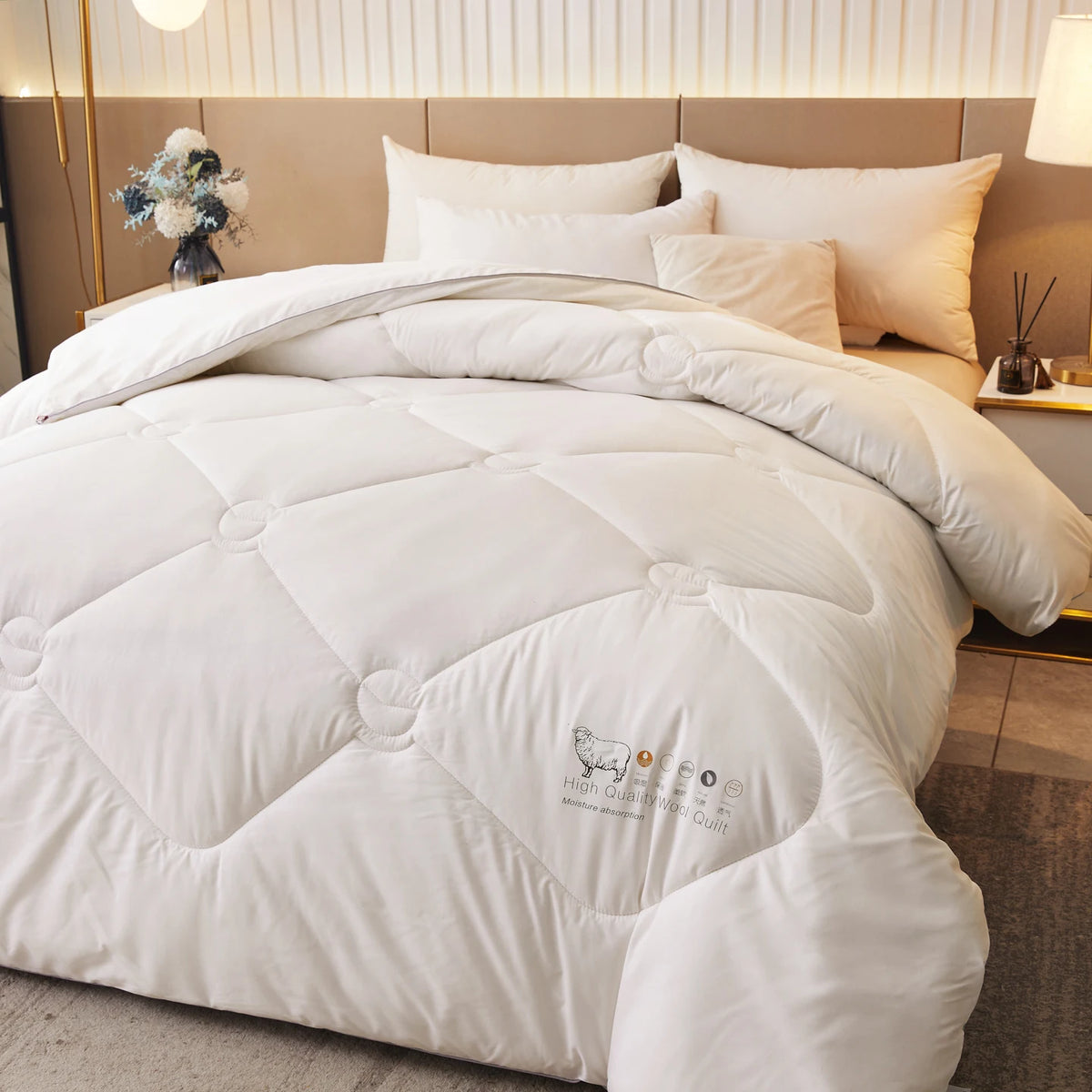 La couette Laine Douce Nuit, vue de face sur le lit