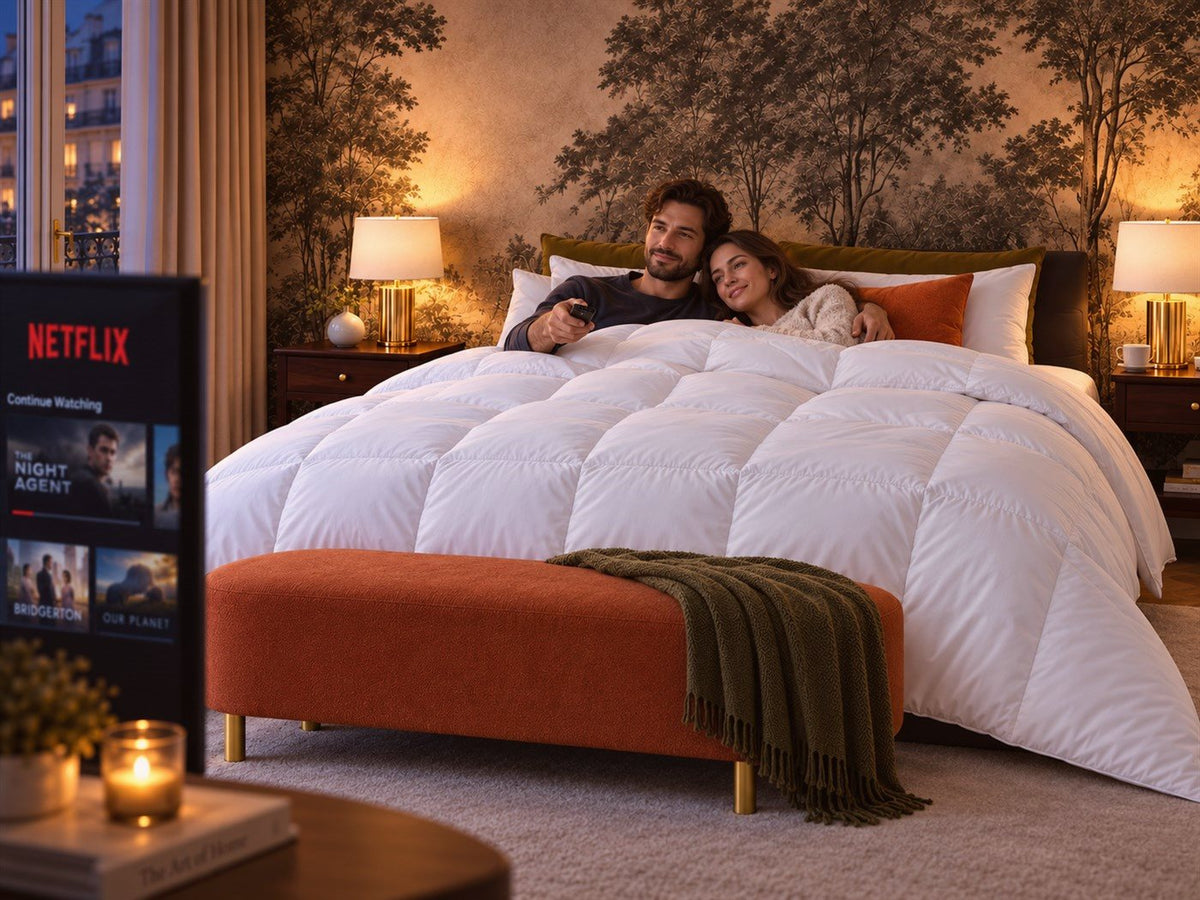 Couple confortablement installé sous la couette Douce Nuit